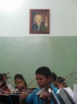 Child practising under Bach El Sistema