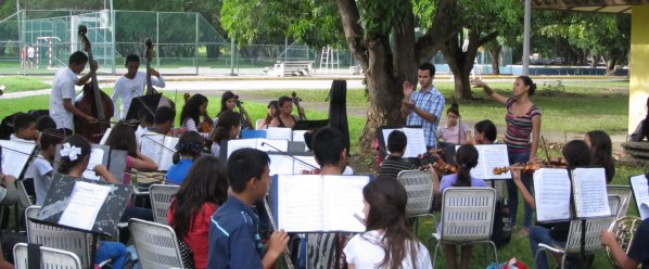 The Orquesta Infantil rehearses under the mango trees
